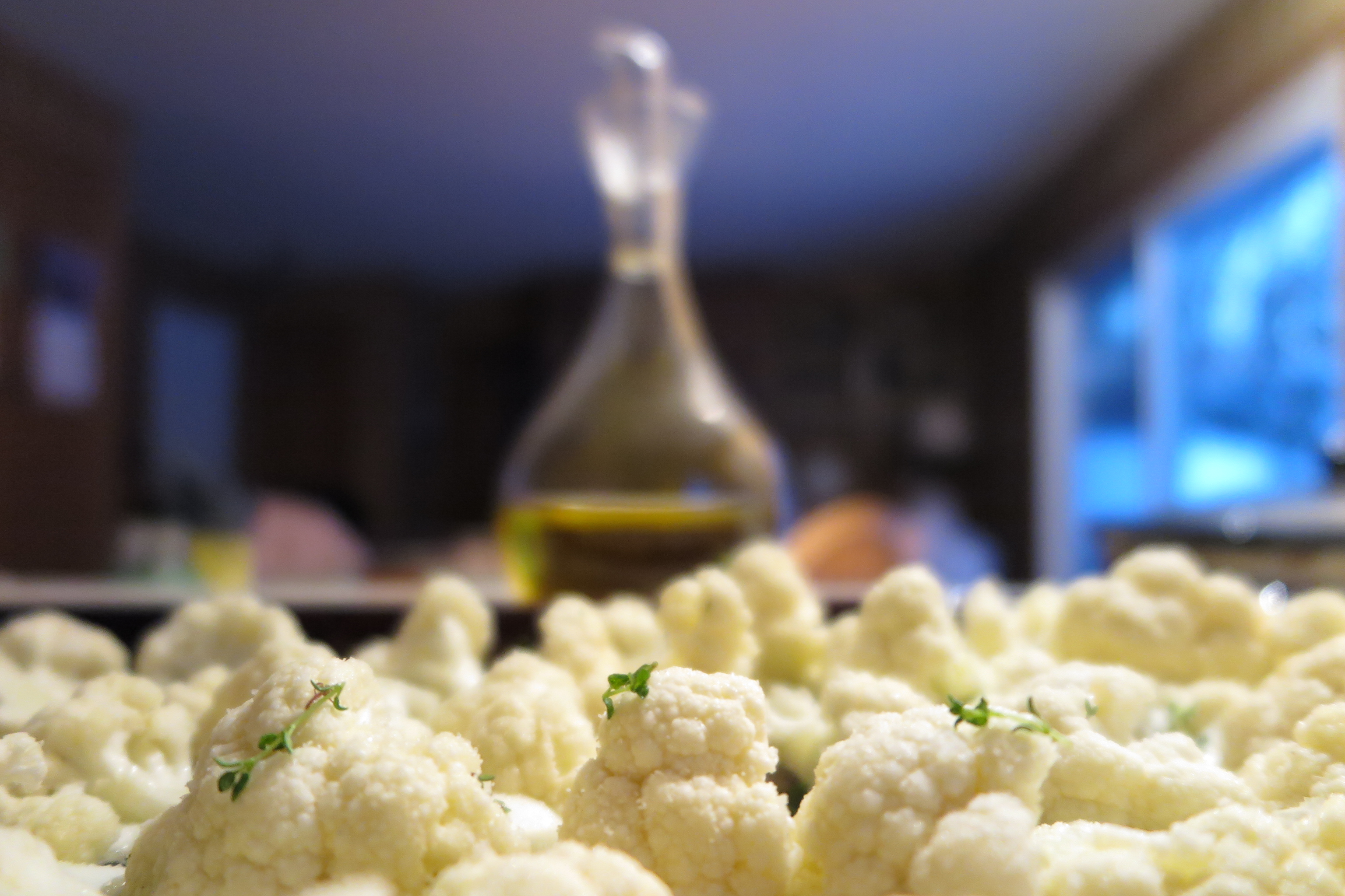 Olive oil cruet and roasted garlic thyme cauliflower